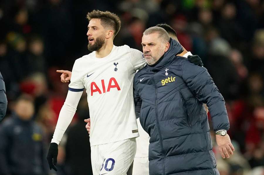 Spurs manager Postecoglou (R) alongside banned midfielder Bentancur