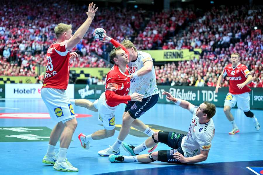 Denmark's Mathias Gidsel (2nd from left) in action against Norway