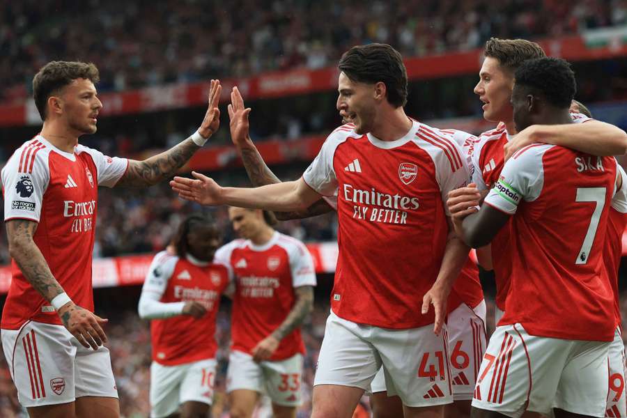 Arsenal's Viktor Gyokeres celebrates scoring against Fulham with teammates