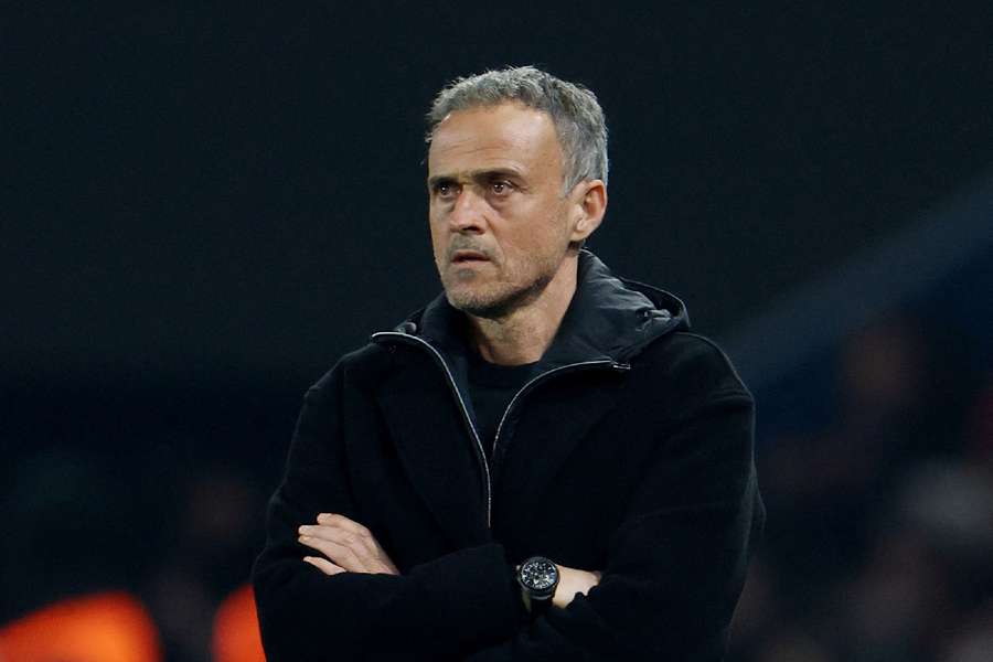 Luis Enrique watches on