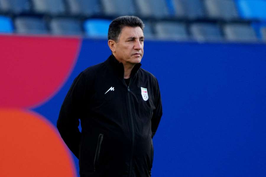 Iran coach AmirGhalenoei inspects the pitch in Los Angeles Iran coach AmirGhalenoei inspects the pitch in Los Angeles