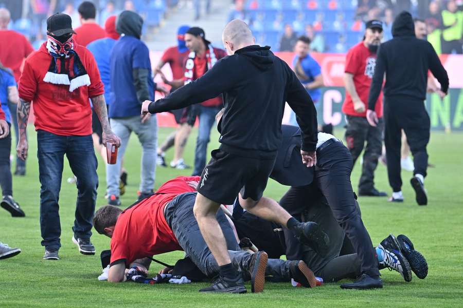 Fans fight after the game