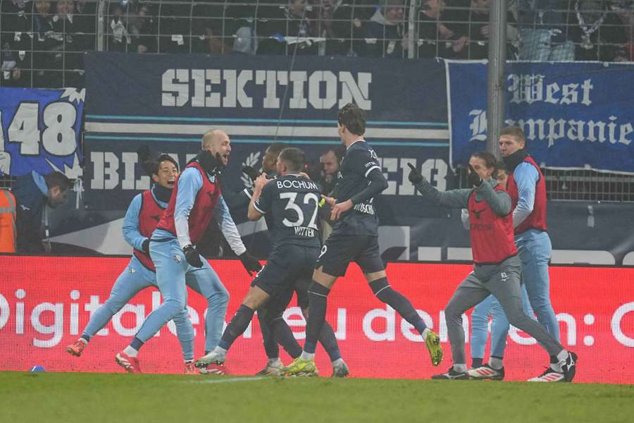 Boadu celebrates with teammates after completing hat-trick