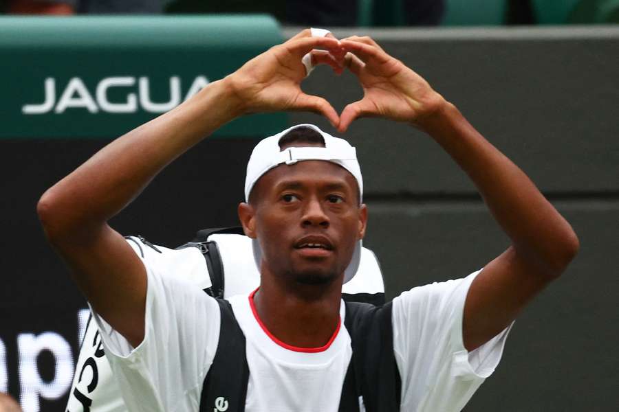 Eubanks gestures to fans after the match