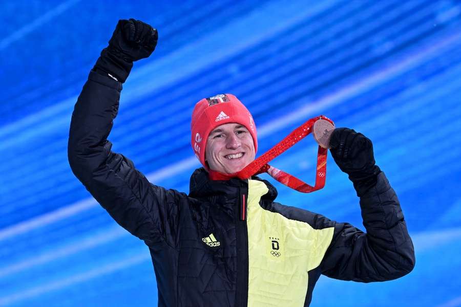 Karl Geiger will bei den Olympischen Winterspielen 2026 mehr als nur Bronze gewinnen.