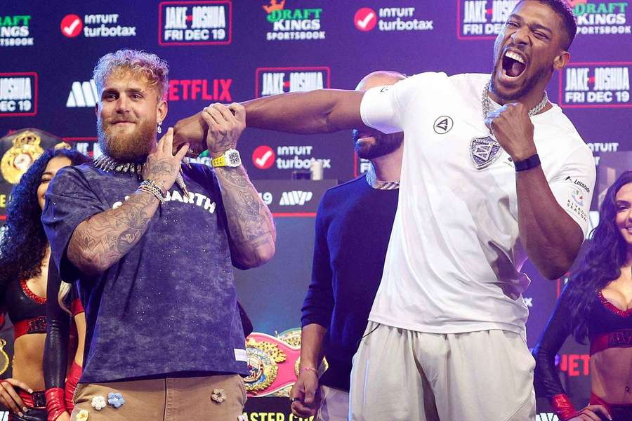 Jake Paul and Anthony Joshua during the weigh-in Jake Paul and Anthony Joshua during the weigh-in