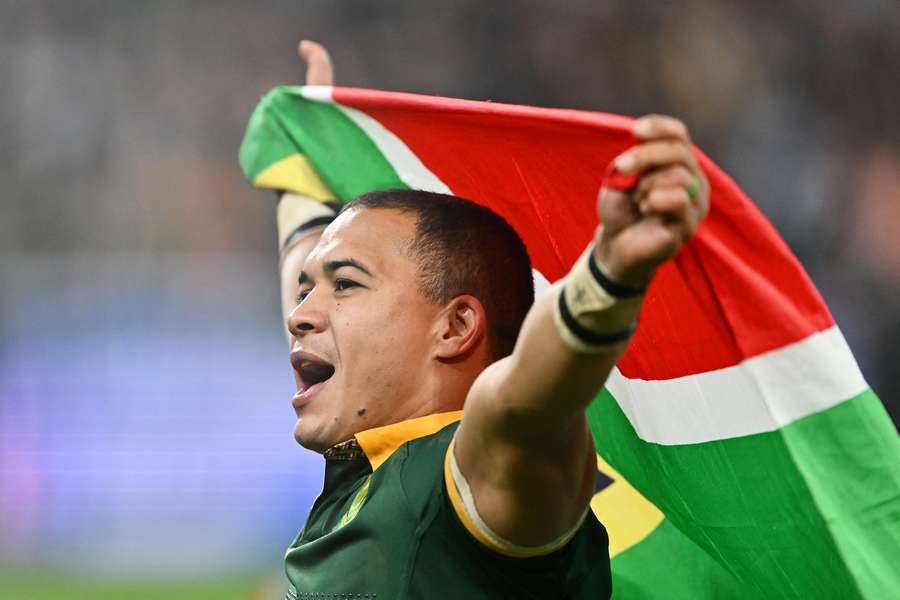 Cheslin Kolbe of South Africa celebrates at full-time after their team's victory in the Rugby World Cup final