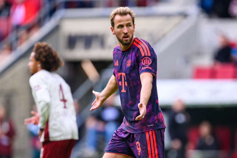 Harry Kane looks on as Augsburg take a shock early lead 