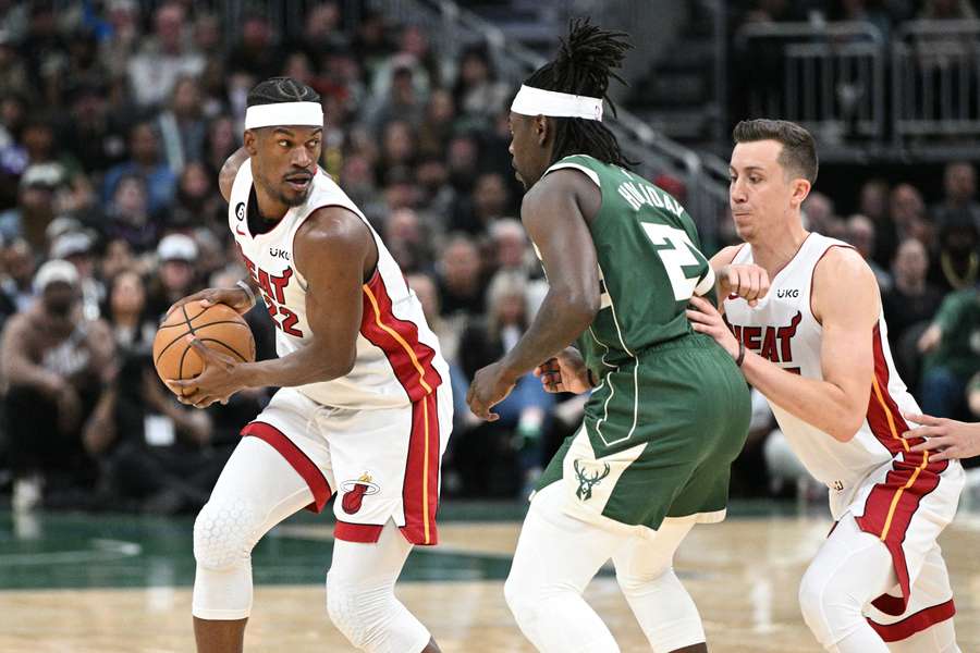 Brilliant Jimmy Butler, left, was on fire in the final quarter for Miami Heat