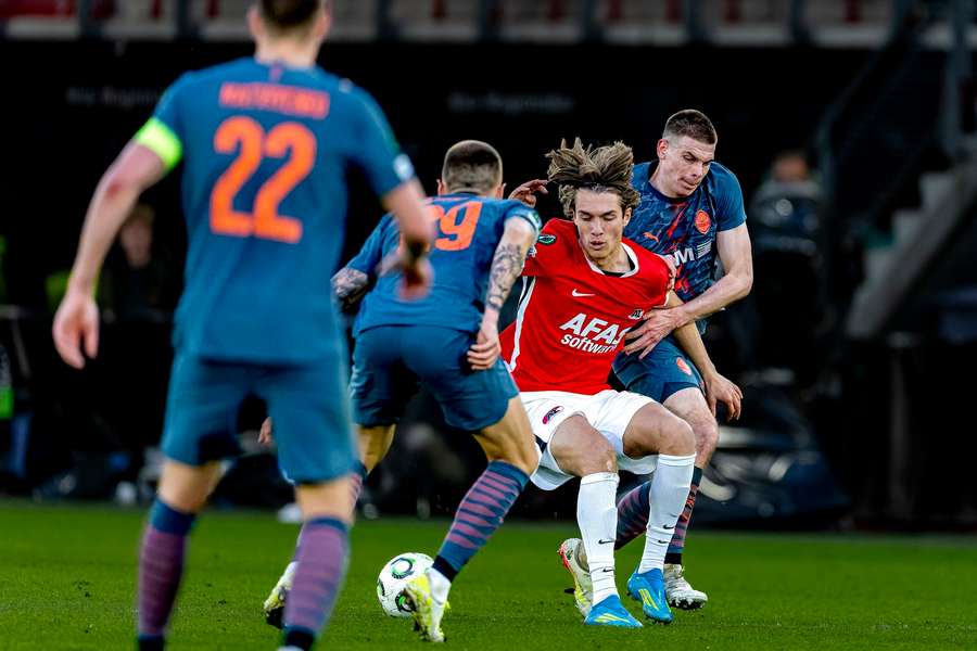 AZ's Rio Robbemond battles with Shakhtar's Oleh Ocheretko