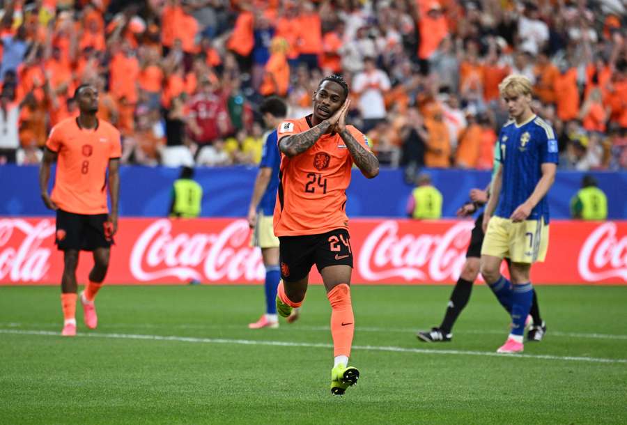 Netherlands' Crysencio Summerville celebrates