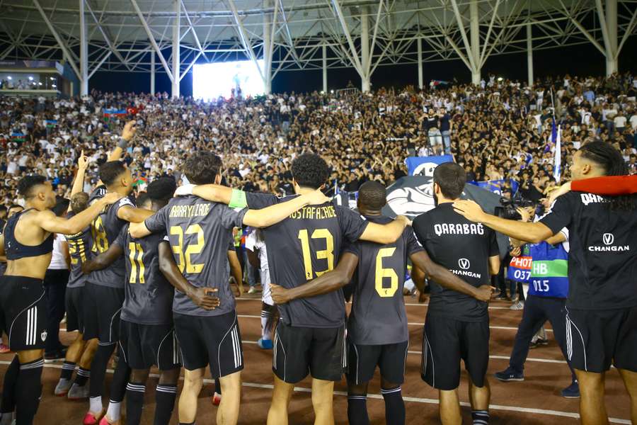 Qarabag celebrate a return to the UEFA Champions League league phase.