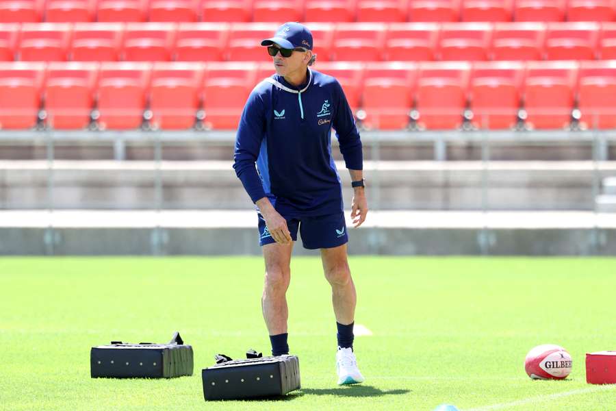 Les Kiss overseeing a captain's run in Japan on Friday. Les Kiss overseeing a captain's run in Japan on Friday.