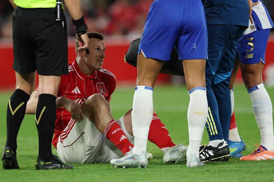 Chris Wood reacts after sustaining an injury