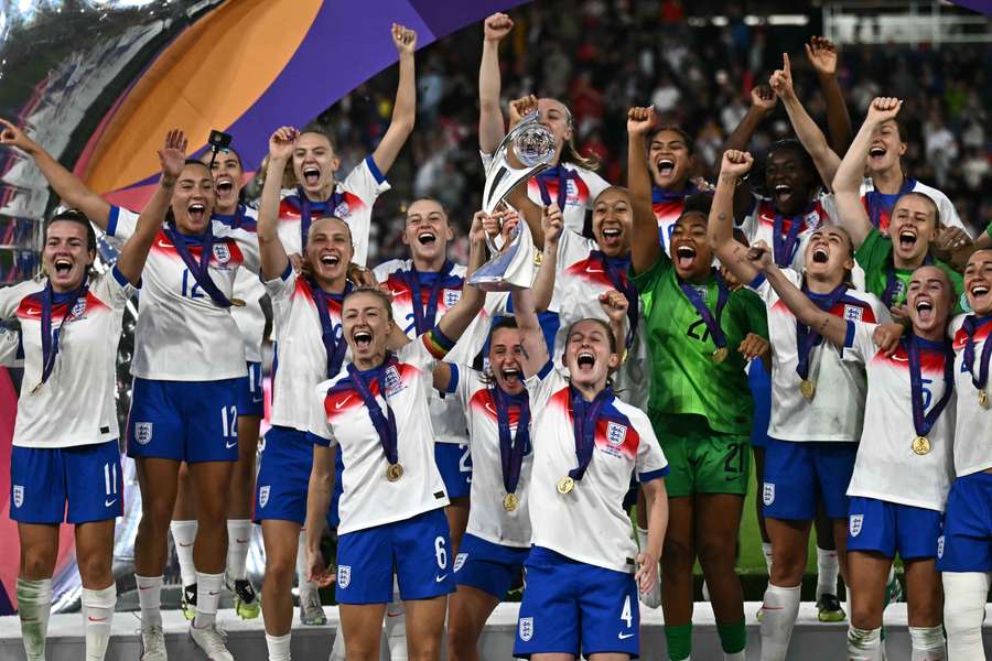 England's players lift the trophy as they celebrate winning the UEFA Women's EURO 2025 final in Basel