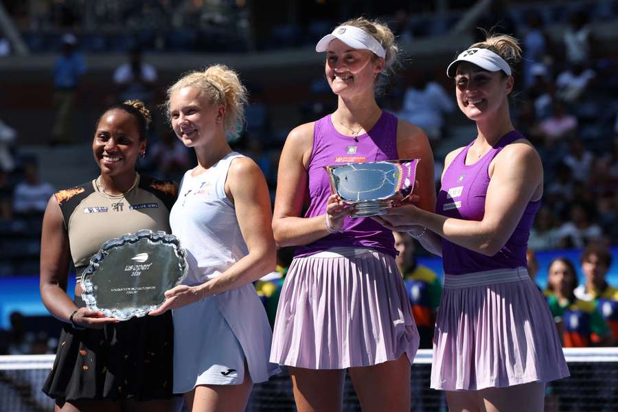 Gabriela Dabrowski and Erin Routliffe pose with the trophy after winning the women's doubles final against Katerina Siniakova and Taylor Townsend Gabriela Dabrowski and Erin Routliffe pose with the trophy after winning the women's doubles final against Katerina Siniakova and Taylor Townsend