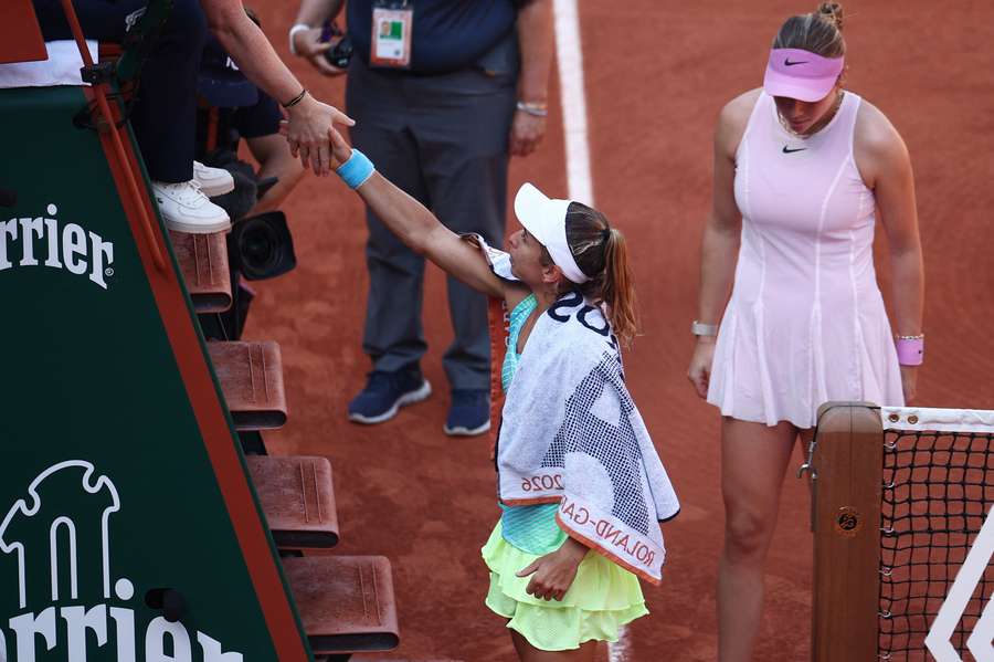 Julia Grabher shakes hands with the chair umpire as she retires from her second round match against Amanda Anisimova Julia Grabher shakes hands with the chair umpire as she retires from her second round match against Amanda Anisimova