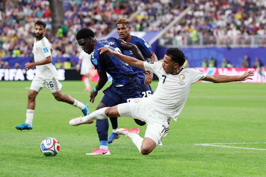 Saudi Arabia's Musab Al-Juwayr in action with Cape Verde's Joao Paulo