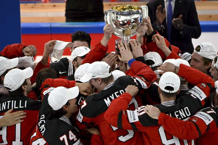 Canada lift the trophy after winning the IIHF World Championship in 2023