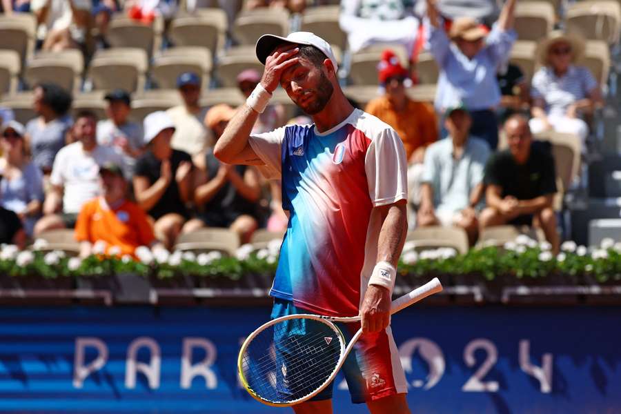 Corentin Moutet looks dejected during his match with Tommy Paul