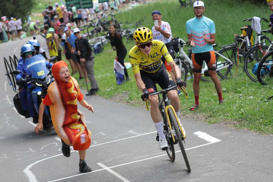 Jumbo-Visma's Danish rider Jonas Vingegaard wearing the overall leader's yellow jersey