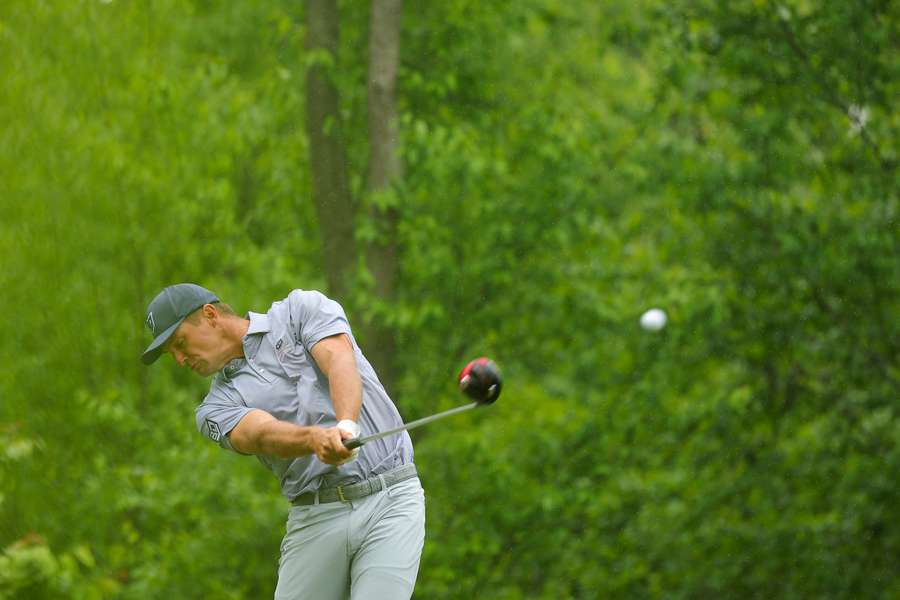 DeChambeau was among the last to begin his second round on the formidable layout in windy and rainy conditions