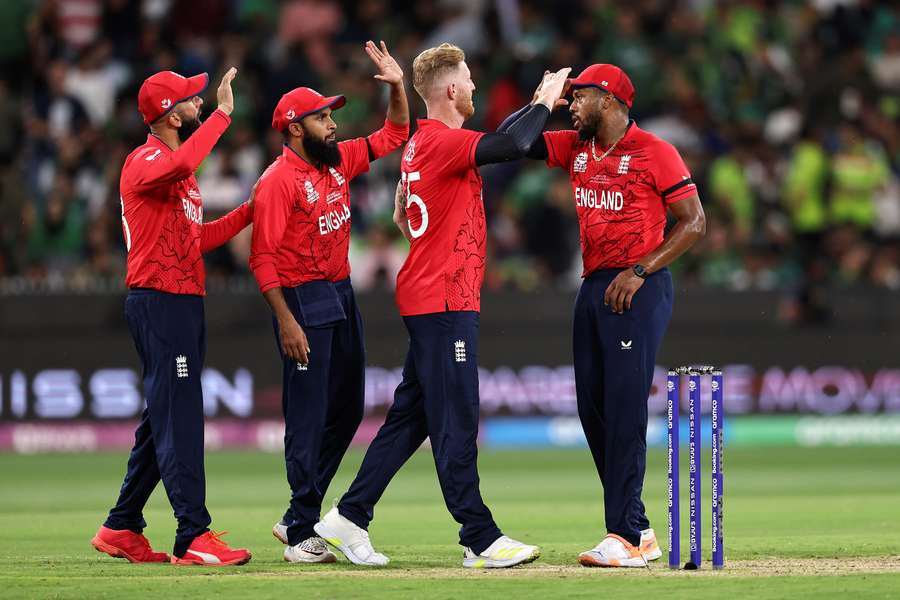 England players greet each others at the end of the innings