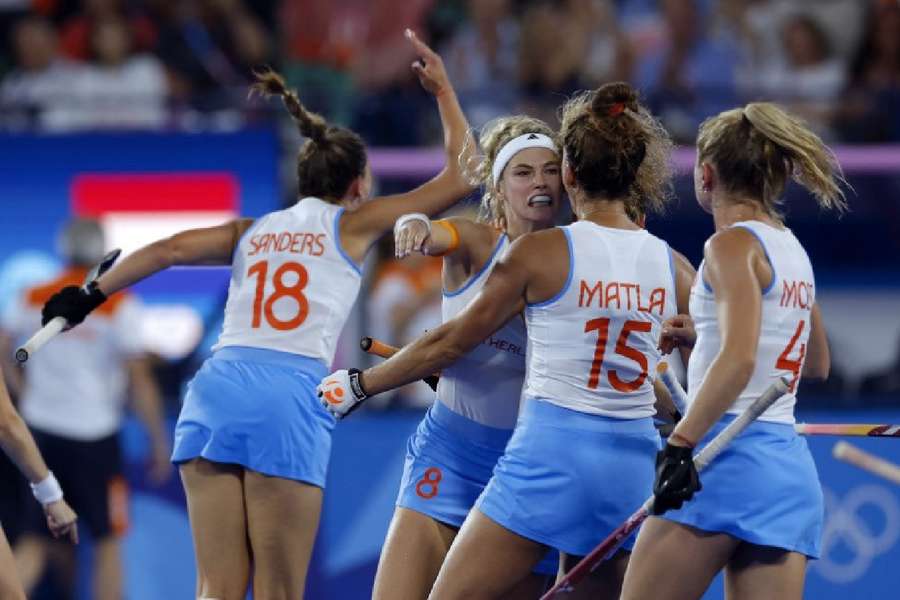 Yibbi Jansen, Pien Sanders and Frederique Matla of the Netherlands celebrate their first goal