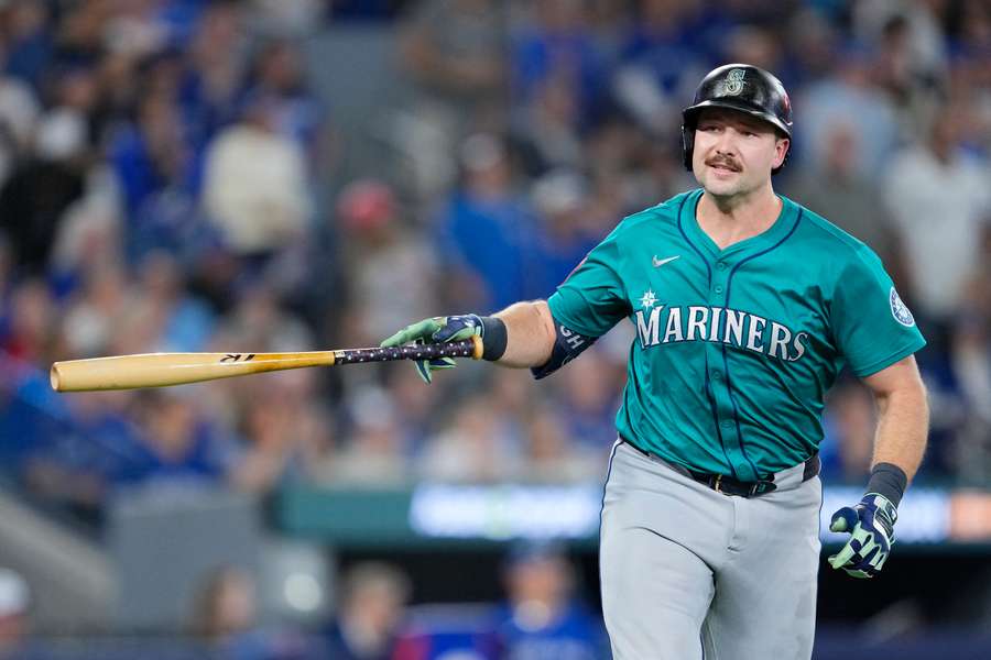 Mariners' Cal Raleigh reacts after hitting a home run in Game 1 of the ALCS against the Toronto Blue Jays