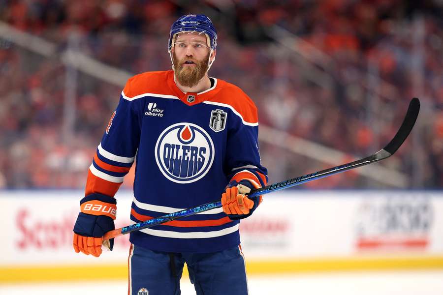 Edmonton Oilers' Mattias Ekholm on the ice during a timeout