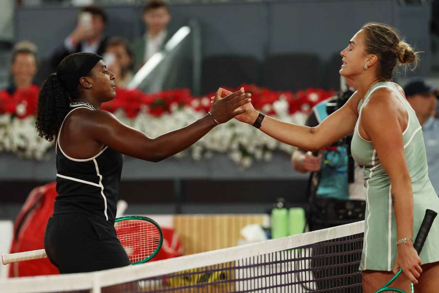 Baptiste (left) shakes hands with Sabalenka