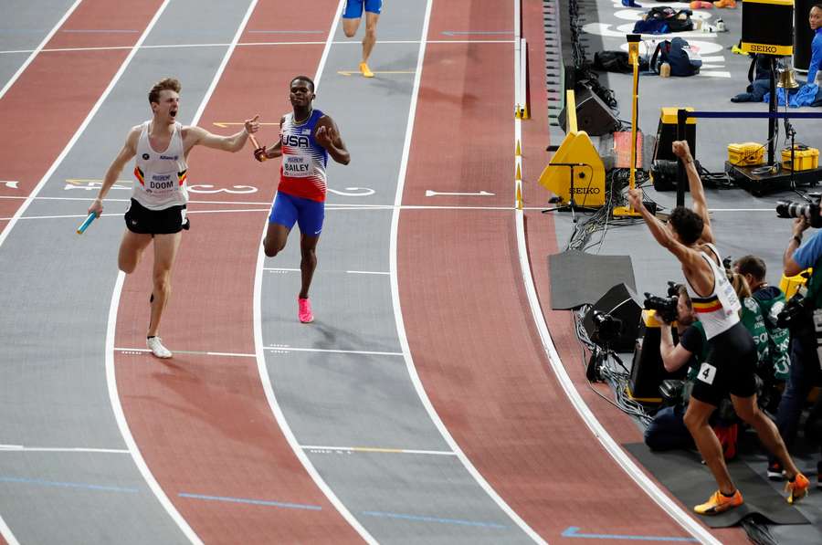 Belgium's Alexander Doom wins the men's 4x400m relay ahead of second placed Christopher Bailey of the USA