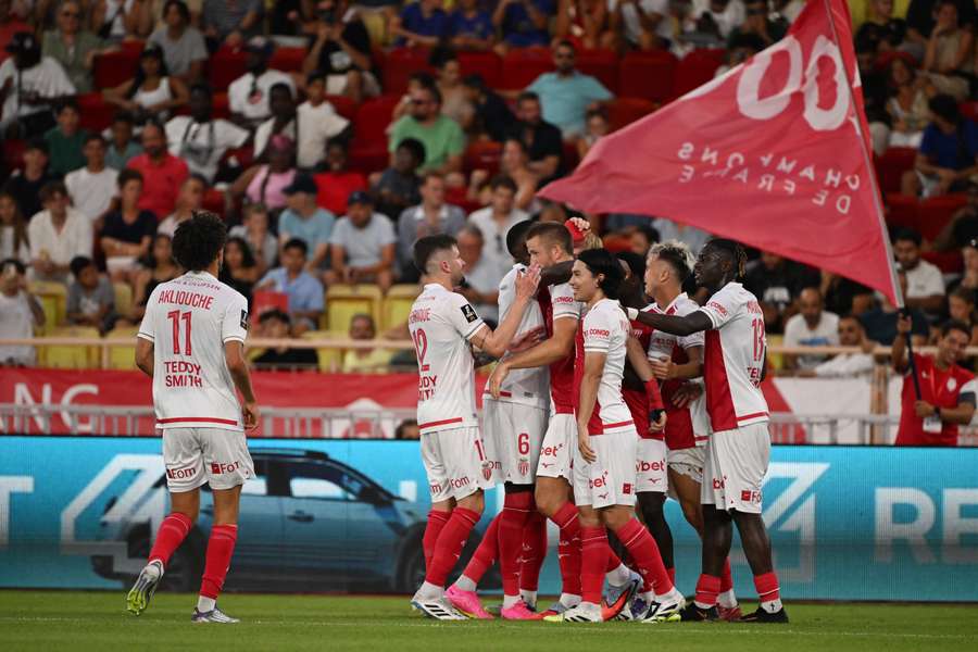 Monaco celebrate Eric Dier's goal Monaco celebrate Eric Dier's goal