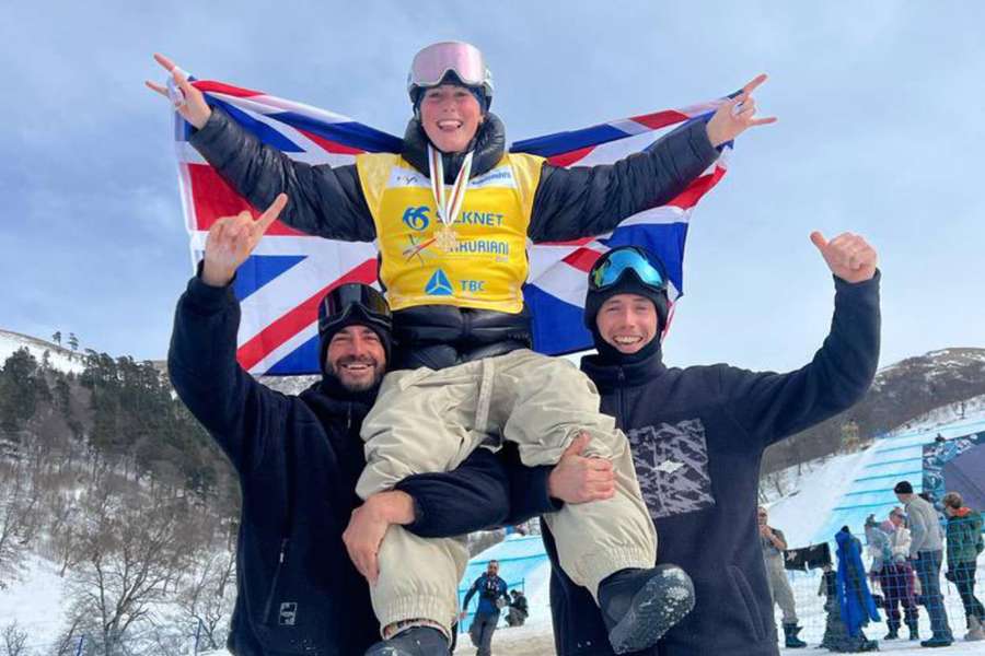 Mia Brookes celebrates with her team after winning gold