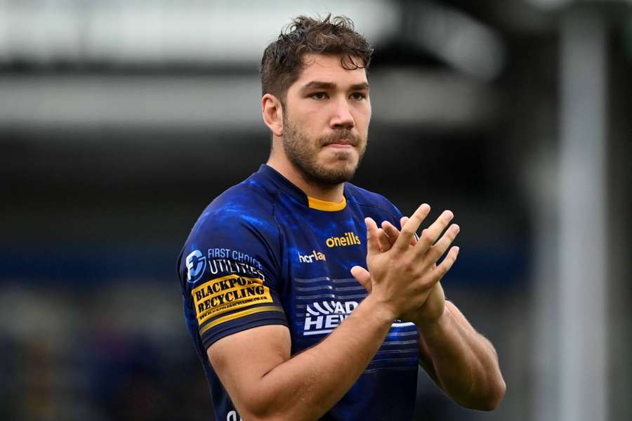 Andrew Kitchener acknowledges the crowd after Warriors' match against Exeter Chiefs in September.