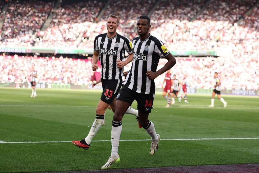 Isak celebrates with fellow goalscorer Gordon