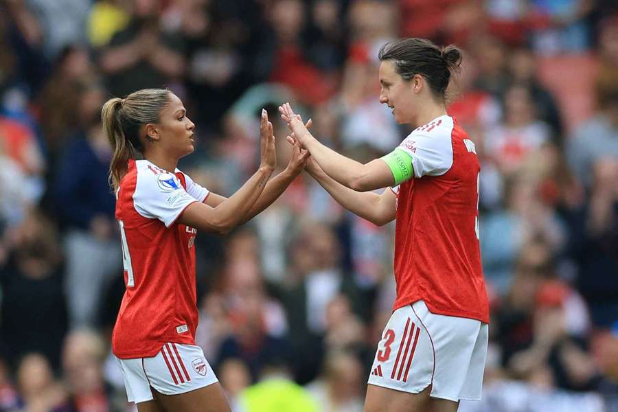 Arsenal's Taylor Hinds and Lotte Wubben-Moy celebrate after the match