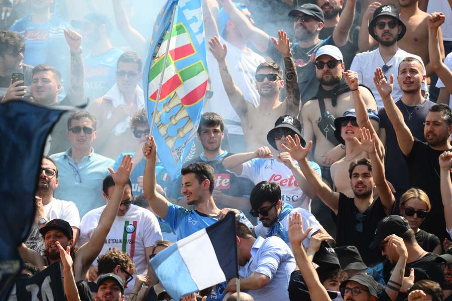Napoli fans cheer prior to the Italian Serie A football match between Bologna and Napoli