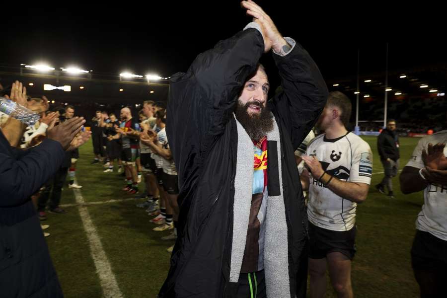 Joe Marler of Harlequins leaves the field to applause after the match