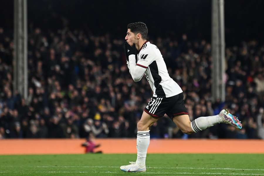 Fulham's Israeli striker Manor Solomon celebrates after scoring their equaliser