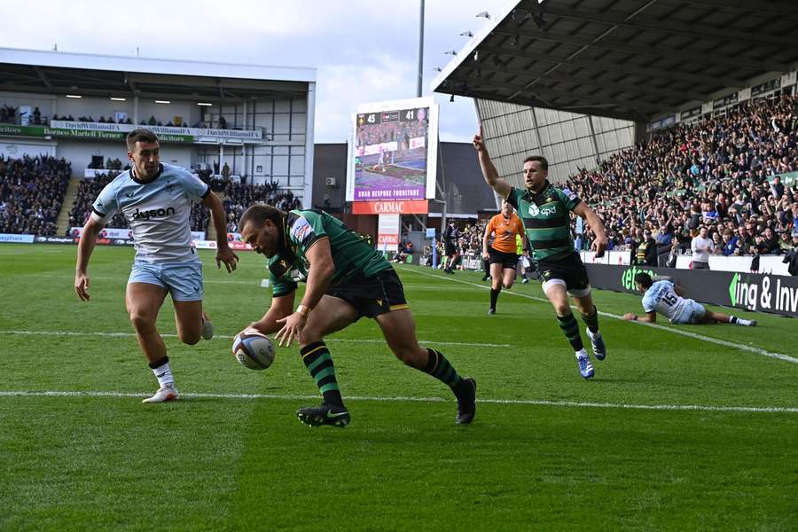 Northampton Saints' Ollie Sleightholme goes over for a try against Bath