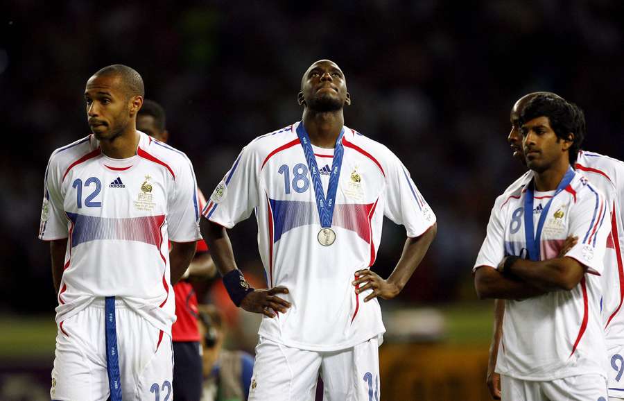 France's Thierry Henry, Alou Diarra, and Vikash Dhorasoo look on after losing the final of the 2006 FIFA World Cup