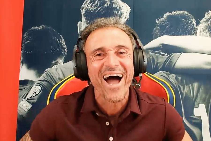 Luis Enrique laughs during one of his Twitch broadcasts.
