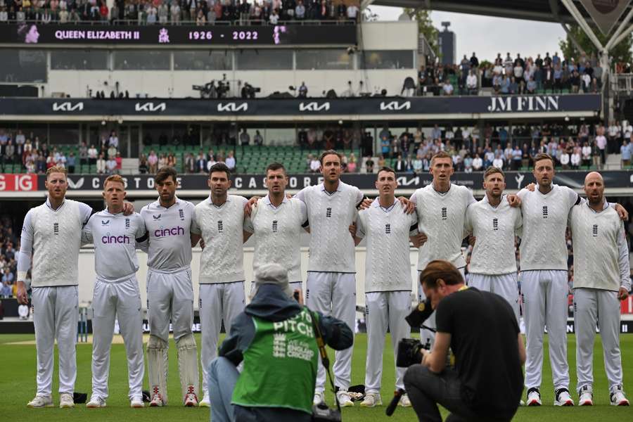 England's cricketers line up for the first rendition of God save the King in 70 years