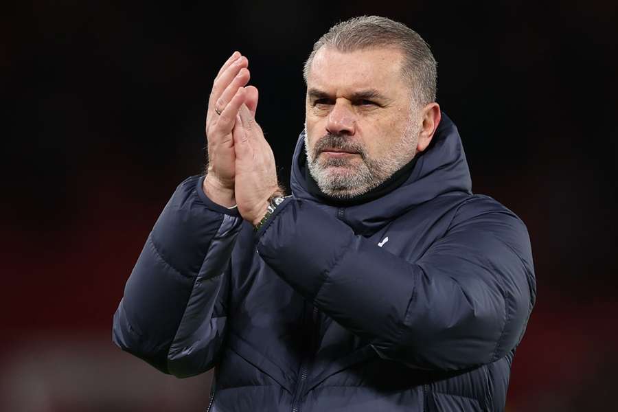 Ange Postecoglou reacts after the English Premier League soccer match between Manchester United and Tottenham