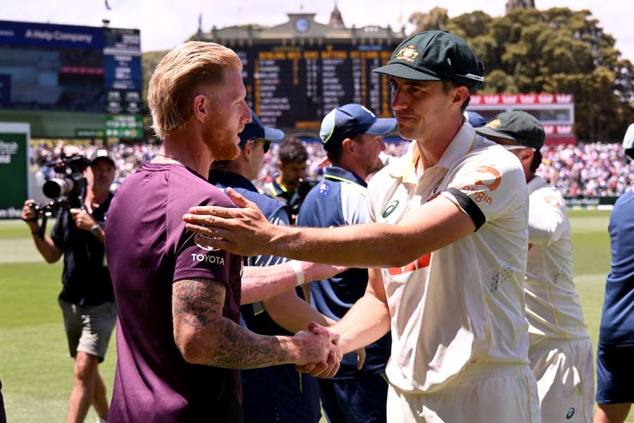 England captain Ben Stokes and Australia captain Pat Cummins shake hands on Sunday.