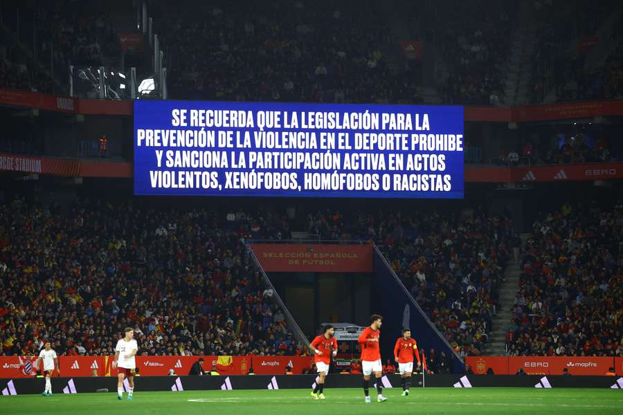 A big screen displays an anti-discrimination message inside the stadium during the match between Spain and Egypt
