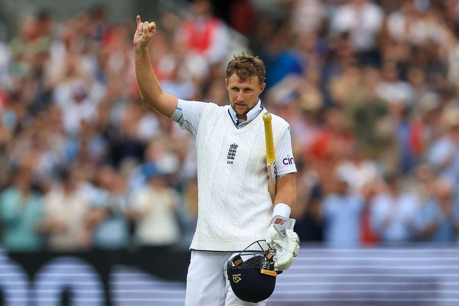 Root celebrates his 100