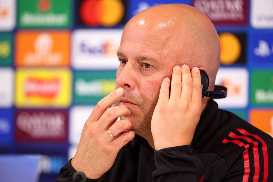 Arne Slot speaks during a press conference