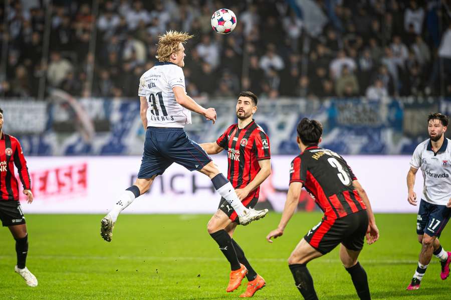 AGF's Tobias Bech fights for the ball with FC Midtjylland's Martin Erlic
